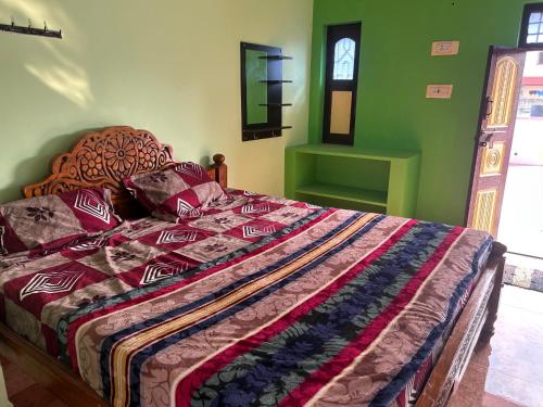 En eller flere senge i et værelse på CR Residency