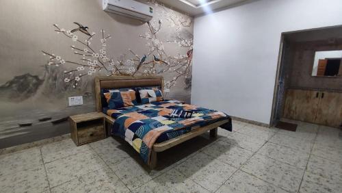 Postel nebo postele na pokoji v ubytování The Gir Village Stay