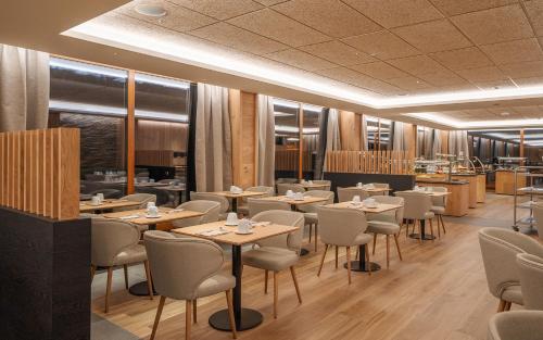 Een restaurant of ander eetgelegenheid bij Hotel Montarto