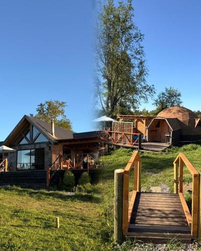 比亚里卡Hostal y Domos Bello Horizonte的前面有木桥的房子