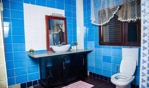 Et badeværelse på Maison Blanche Biteng