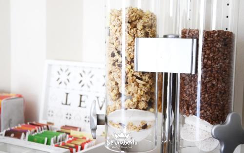 a glass vase filled with nuts on a table at RE UMBERTO b&b - Suite di charme e Country rooms in San Salvo