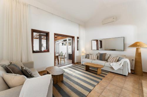 En eller flere senge i et værelse på Kaizen Volcano Home