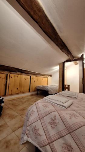 En eller flere senge i et værelse på Agriturismo il Fosso La Casa Piccola