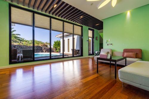 Postel nebo postele na pokoji v ubytování Libentia Hotel & Poolvilla