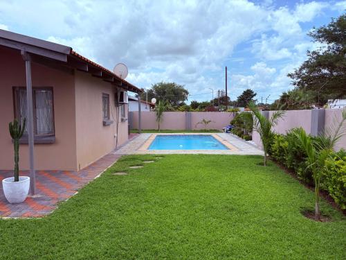 Afbeelding uit fotogalerij van The August Home in Gaborone