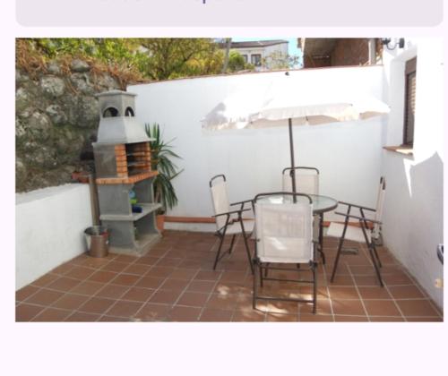 Acogedora casita con barbacoa