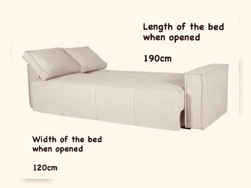 un letto bianco con due descrizioni del letto a confronto di Guest House Salo-City a Salo