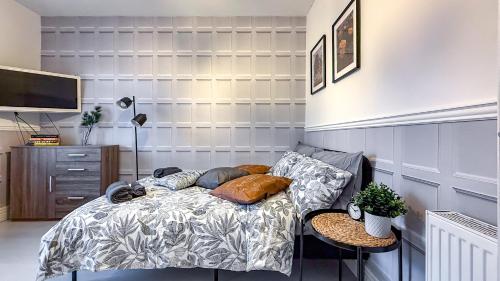 En eller flere senge i et værelse på Quite and new Glasgow house, Commore Drive