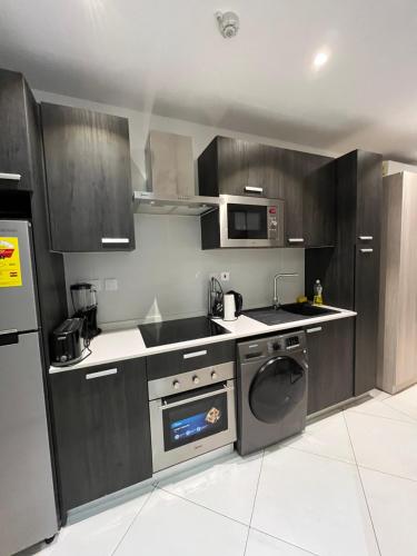 Køkken eller tekøkken på Nickgard Homes The Lennox