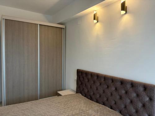 En eller flere senger på et rom på RIO Apartment