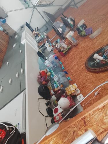 an overhead view of a kitchen with a counter top at Kurandero Temple in Bensafrim