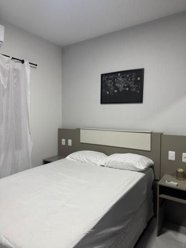 En eller flere senge i et værelse på Casa na praia de Capão da Canoa