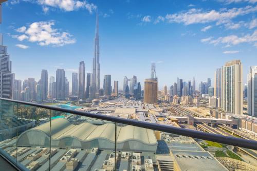 a view of a city from the top of a building at The Address Fountain Views - Residence 2 Bedroom with Burj Khalifa view and access to Dubai mall in Dubai