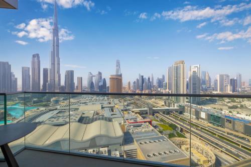 a view of a city skyline from a building at The Address Fountain Views - Residence 2 Bedroom with Burj Khalifa view and access to Dubai mall in Dubai