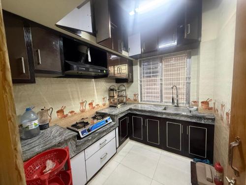 Kuchyň nebo kuchyňský kout v ubytování khilkhet,Dhaka