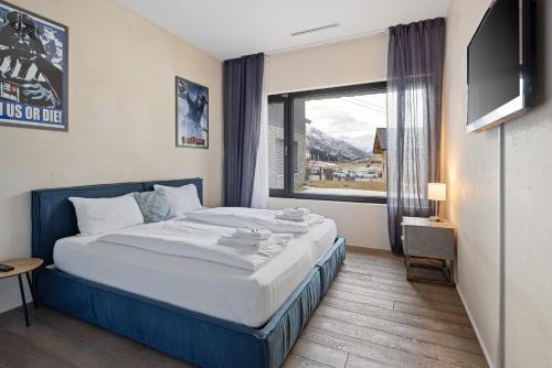 Postel nebo postele na pokoji v ubytování Bergblick Apartment I Andermatt I Mountain I Familien