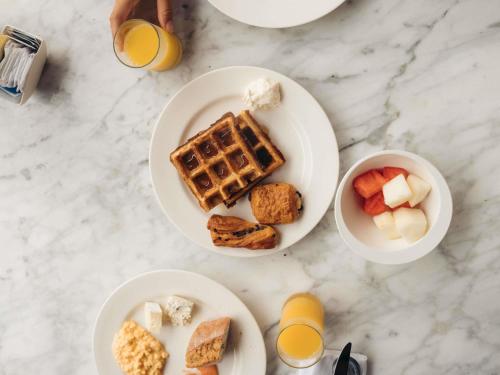 Morgenmad for gæster der bor på Sofitel Singapore Sentosa
