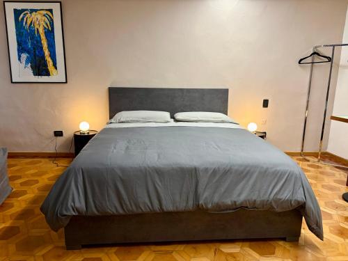 En eller flere senge i et værelse på Maison Vasari - Centro Storico di Arezzo