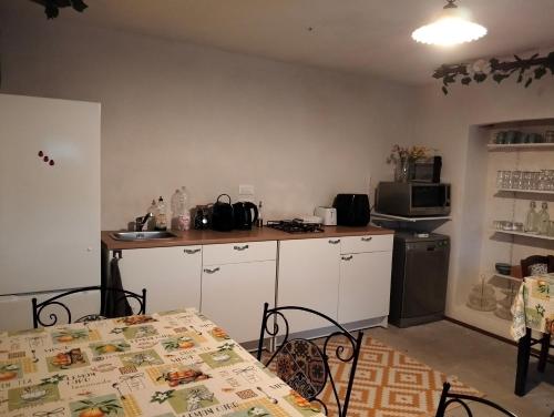 Køkken eller tekøkken på B&B Valle del Fino