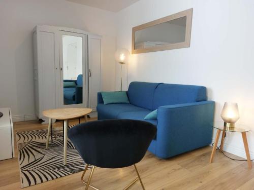 Posezení v ubytování Le Bompard 50 m2 Villa Art Déco Plein centre avec jardin