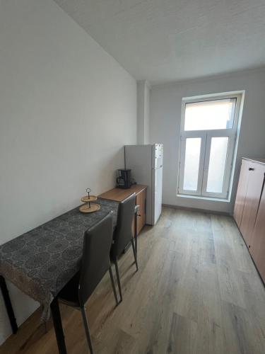Køkken eller tekøkken på Cosy flat close to Ghent station