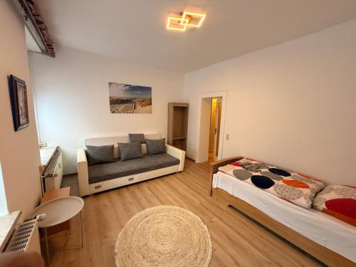 Giường trong phòng chung tại Ferienwohnung Goldener Drache