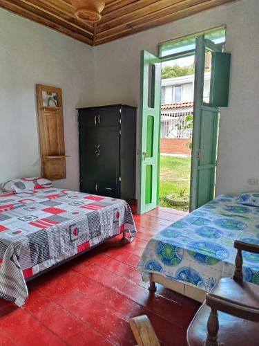 Krevet ili kreveti u jedinici u okviru objekta Koniminto Hostal