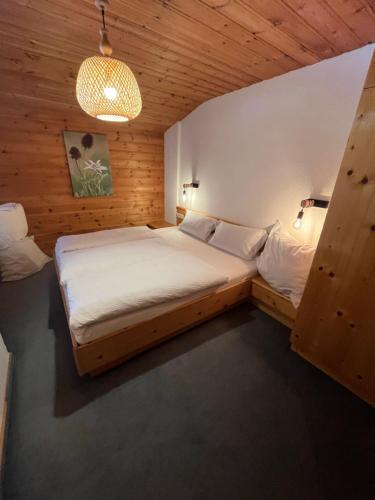 Postel nebo postele na pokoji v ubytování Apart Dorfbäck