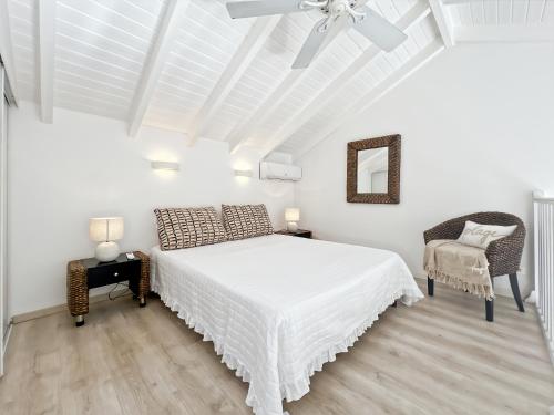 Voodi või voodid majutusasutuse Mango Vert Duplex - Orient Bay toas