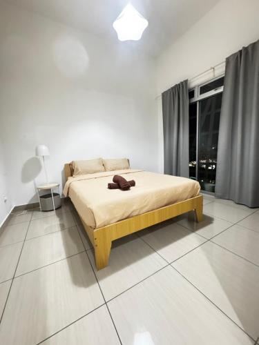 En eller flere senge i et værelse på Comfort Suites Austin Johor bahru