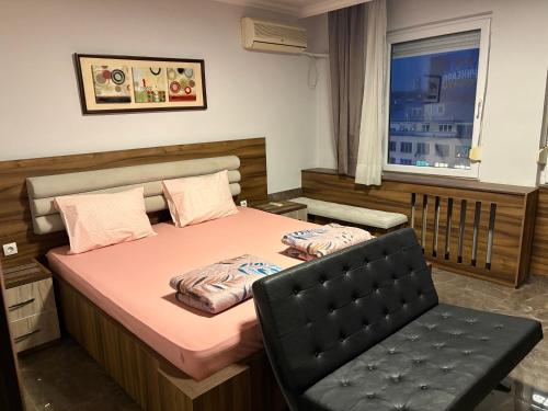 Krevet ili kreveti u jedinici u okviru objekta Times Square Studio