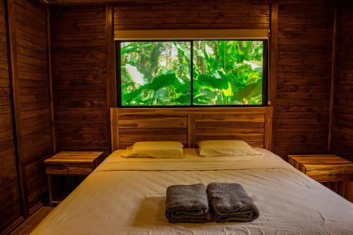 En eller flere senge i et værelse på Casa Arima