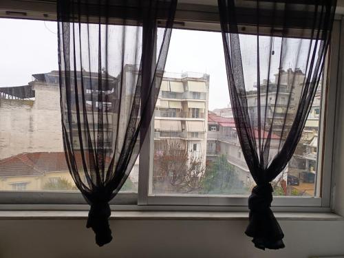 Een algemene foto van Kardítsa of een uitzicht op de stad vanuit het appartement