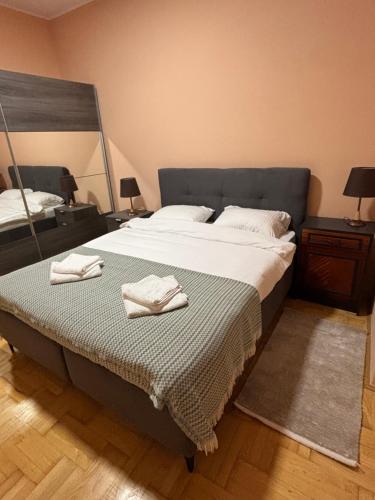 En eller flere senge i et værelse på Giardino