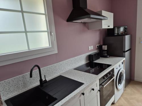 Kuchyň nebo kuchyňský kout v ubytování Casa Tía, L'hacienda de Soubran, classé 4 étoiles