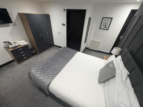 En eller flere senge i et værelse på Woodhouse Hotel Blackpool Promenade