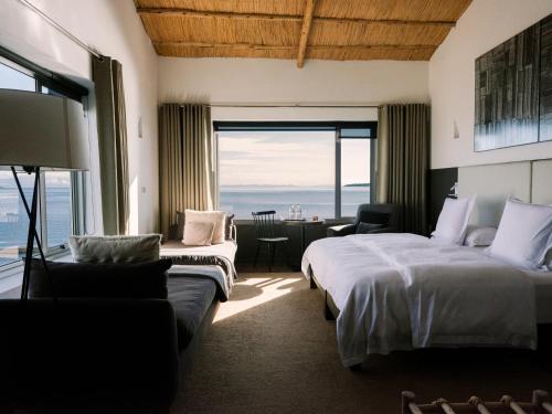 Postel nebo postele na pokoji v ubytování Titilaka by Andean