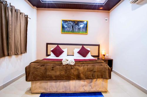 Giường trong phòng chung tại Hotel Jungle Palace Resort
