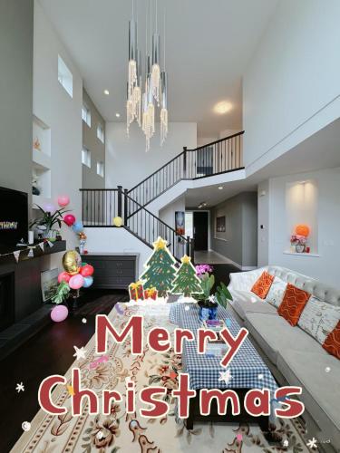 a living room with a christmas tree on the floor at 安静社区主楼层豪华主卧套房&独立浴室浴缸 in Coquitlam