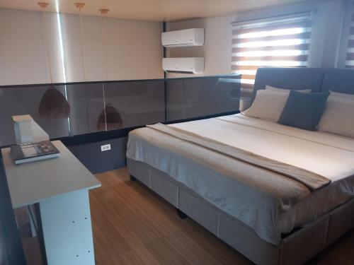 Postel nebo postele na pokoji v ubytování Del Mar Santa Catalina