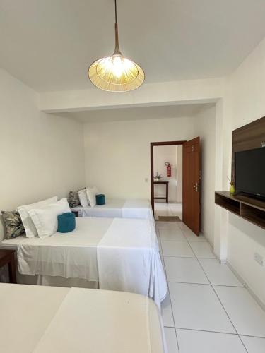 Et tv og/eller underholdning på Pousada Sol & Mar