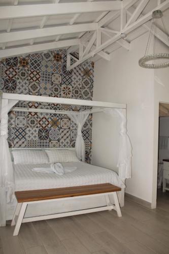 En eller flere senge i et værelse på Hotel Arenal Vista Lodge