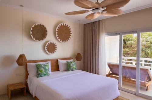 Giường trong phòng chung tại Cocoon