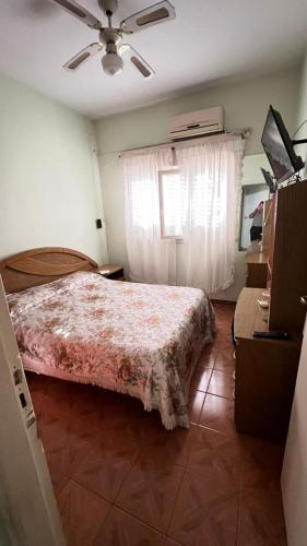 En eller flere senge i et værelse på CASA Avenida III