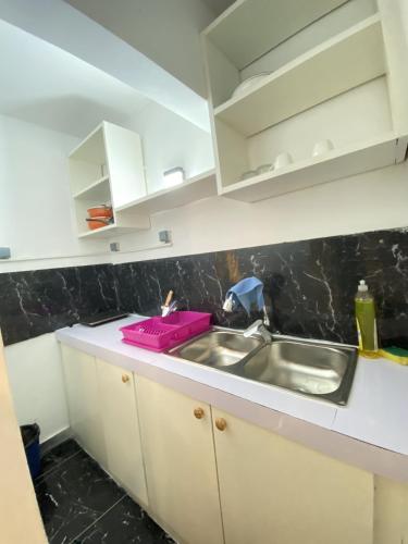 Køkken eller tekøkken på Apartement Chaleureux et Prestigieux