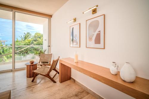 a home office with a desk and a window at Greta Puerto Morelos - By Aloja RV in Puerto Morelos