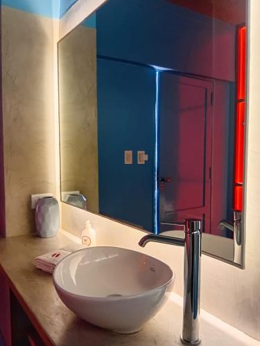 a bathroom sink with a large white bowl on a counter at Hotel Windsor Mendoza in Mendoza