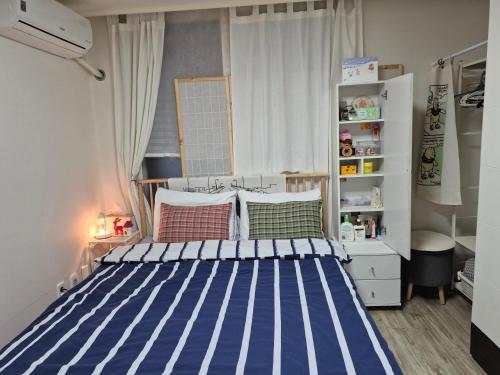 En eller flere senge i et værelse på 달빛누리