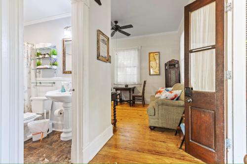a room with a bathroom with a sink and a toilet at The Island Suite at KW Vacation in Key West